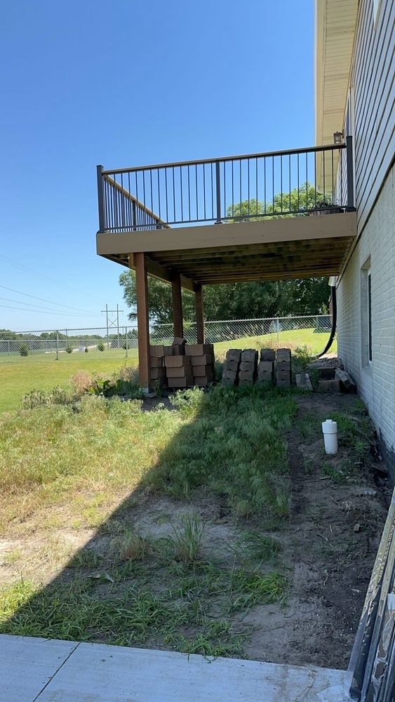 Elevated deck build with metal railings